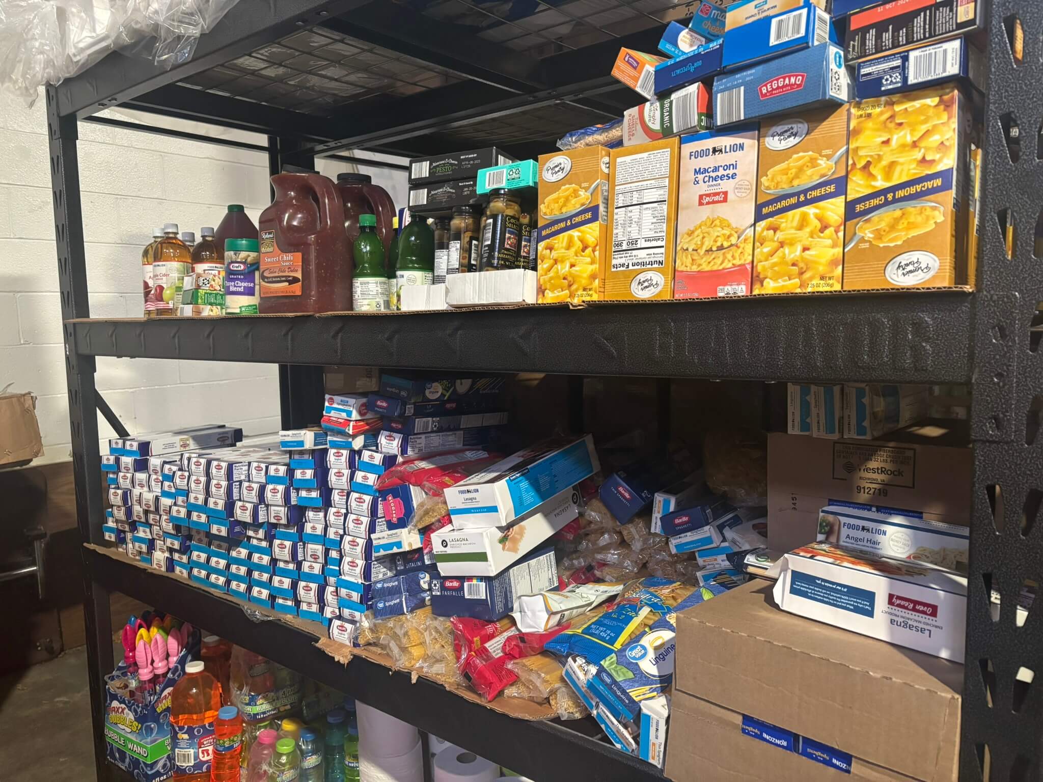 Before showing unorganized cans in aisle. 
